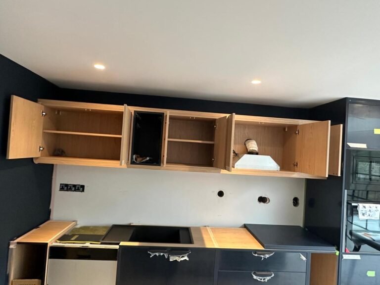 Kitchen cupboards cleaned inside and out during a move out clean